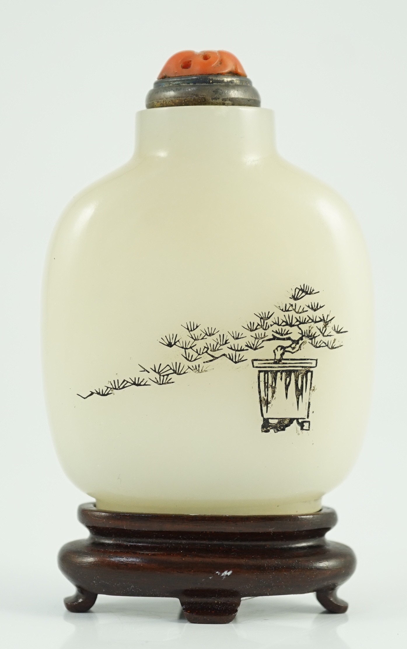 A Chinese inscribed white jade snuff bottle, 19th century, 6.7cm high, metal and coral stopper